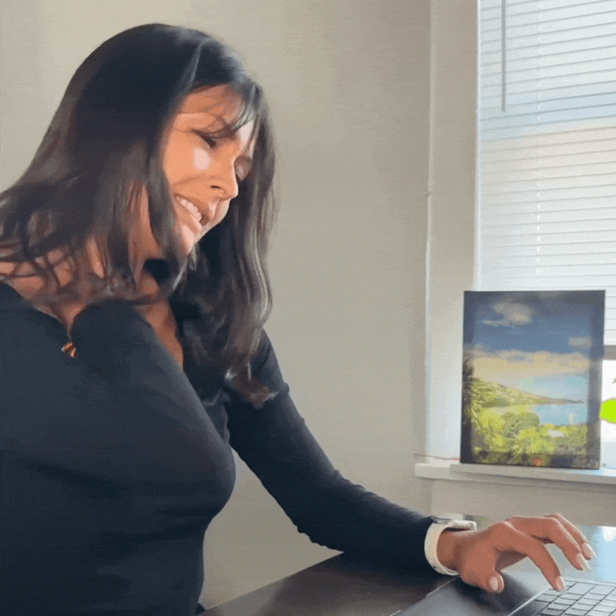 Woman in pain looking out window
